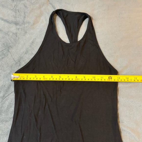 Lululemon Athletica Black Fitted Cut Out Tank Top

#1079 - Picture 2 of 5